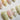 Almond nail designs — hand-painted floral, French tip, and artistic press-on nails in almond shape by Joyee Nails