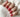 Red polka-dot artistic nail art.