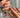 Colorful short squoval press-on nails with bright mixed summer shades — the universally flattering squoval nail shape shown on natural hands, handmade by Joyee Nails.