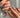 Colorful short squoval press-on nails with bright mixed summer shades — the universally flattering squoval nail shape shown on natural hands, handmade by Joyee Nails.