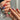 Colorful short squoval press-on nails with bright mixed summer shades — the universally flattering squoval nail shape shown on natural hands, handmade by Joyee Nails.