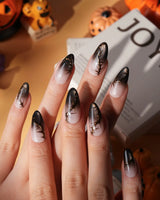 Black Briar press on nails with a nude to black cat eye ombre and raised gold thorn branches - image 1