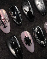 Gothic Dollhouse pink goth press on nails with a black candelabra, silver mirror, crosses, 3D gold roses and a skull on pink and black - image 1