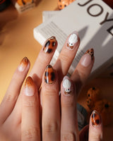 Leopard Boo press on nails with ghosts wearing leopard bows, amber tortoiseshell with gold chrome and leopard print French tips - image 2