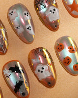 Candy Bucket press on nails with a 3D jack-o'-lantern, puffy 3D ghosts, bats and silver stars on an aurora finish with orange edges - image 2