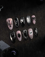 Gothic Dollhouse pink goth press on nails with a black candelabra, silver mirror, crosses, 3D gold roses and a skull on pink and black - image 3
