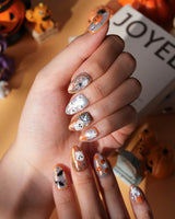 Candy Bucket press on nails with a 3D jack-o'-lantern, puffy 3D ghosts, bats and silver stars on an aurora finish with orange edges - image 3