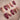 Velvet Flow press-on nails with sultry berry red cat-eye texture and metallic butterfly wings