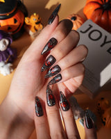 Cathedral Rose gothic press on nails with red glitter roses, hearts and mint leaves in black stained glass lines on a smoky sheer base - image 4