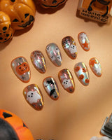 Candy Bucket press on nails with a 3D jack-o'-lantern, puffy 3D ghosts, bats and silver stars on an aurora finish with orange edges - image 4