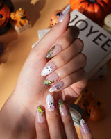 Fairy Ring press on nails with 3D pink and lime mushrooms, a glitter ghost with pink bow and lime green cat eye tips with gold vines - image 4