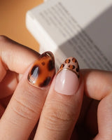 Leopard Boo press on nails with ghosts wearing leopard bows, amber tortoiseshell with gold chrome and leopard print French tips - image 5