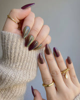Brown Acrylic Cat-eye nail art close-up showing Berry Mauve cat eye details