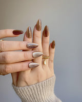 Light Brown Color Cat-eye Nails nail art close-up showing light brown cat eye details
