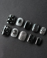 Black & Silver Void handmade press-on nails featuring black aura swirl abstract nails