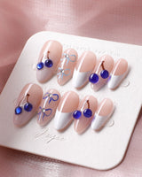 Klein Blue Cherry handmade nails with crisp French tips and cobalt blue cherries
