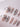 Miffy's Vacay medium almond nails with 3D headphone rabbit detail and silver chrome accents