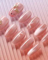 Thump Bunny pink cat-eye heart nail set with playful bunny accent