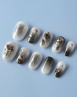 Night Butterfly custom press-on nails — available in multiple shapes and sizes