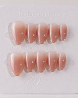 Clean Grace press-on nails in extra short almond shape — gold french tip nails