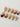Fall Palette press-on nails with mixed autumn colors and fall-inspired gel details