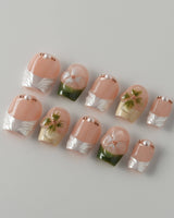 Duchess Olive press-on nails with glossy olive green 3D flowers and soft nude base