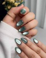 Mint Orb handmade press-on nails featuring Glacier Green Cat Eye