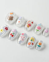 Squishy Pop extra short almond nails with vibrant squishy-pop inspired details