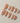 Venus handmade press-on nails featuring Pearly Nude, 3D Shells & Gold.