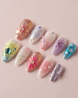 Gem Blossom press-on nails — pastel mix design chrome