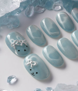 Thump Bunny_Macaron handmade press-on nails featuring ice blue, Heart Magnet Cat Eye.