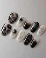 Black & Silver Void custom press-on nails — available in multiple shapes and sizes