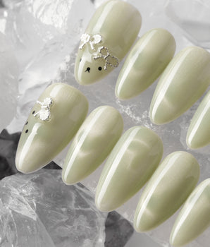 Thump Bunny_Mint handmade press-on nails featuring Sage Green, Velvet Cat Eye Bow.