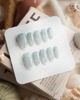 Still Water handmade mint green press-on nails with fresh just-out-of-water shine
