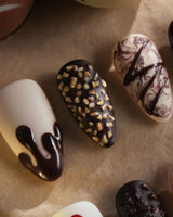 Chocolate Box press-on nails with dimensional chocolate details and sweet dessert-inspired accents