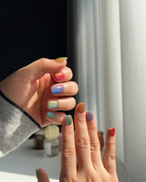 Colored Stone nail art close-up showing Colorful Cat Eye Nails details
