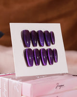 Grape Color Cat-eye press-on nails in medium coffin shape — purple cat eye nails