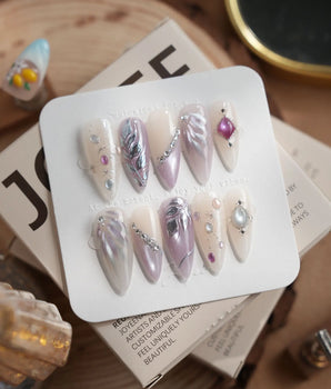 The Cygnus press-on nails — silver lilac cat eye feather chrome rhinestone cat eye effect handmade nail art by Joyee Nails