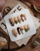 THE HEIR press-on nails with vintage plaid, metallic horsebit details and equestrian silhouettes