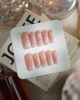 Frost Petals press-on nails — Sheer Nude Pink, Delicate White Snowflakes. handmade nail art by Joyee Nails