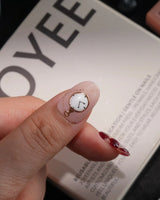 Alice in Wonderland handmade press-on nails in short oval shape by Joyee Nails