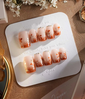 Amber Maple press-on nails — orange french tips gold outline maple leaves handmade nail art by Joyee Nails