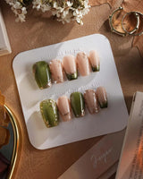 Aquagrass - Liquid Ballerina press-on nails in short coffin shape — Vintage Olive Green, Embossed Gold Leaves & French Tips.