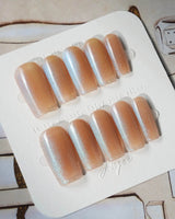 Aurora Icefire press-on nails in medium square shape — Icy Iridescent Cat Eye.