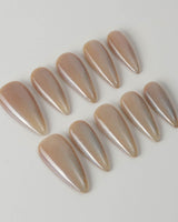 Aurora Icefire press-on nails in medium stiletto shape — Icy Iridescent Cat Eye.