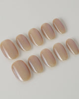 Aurora Icefire press-on nails in short oval shape — Icy Iridescent Cat Eye.