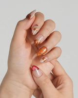 Autumn Bounty press-on nails with fall fruit accents, gold outlines and dimensional gel art