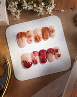 Autumn Bounty press-on nails with playful 3D pumpkins, apples and fall gel accents