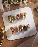 Autumn Tales press-on nails with cozy woodland scene, hedgehog accent and mushroom details