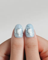 Baby Seals playful summer nail set with lifebuoys, blue water, and sculpted seals